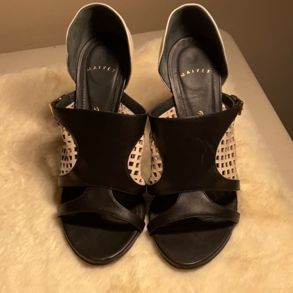 Mai yet black ivory Napa calfskin bootie. Name of she is Natalie